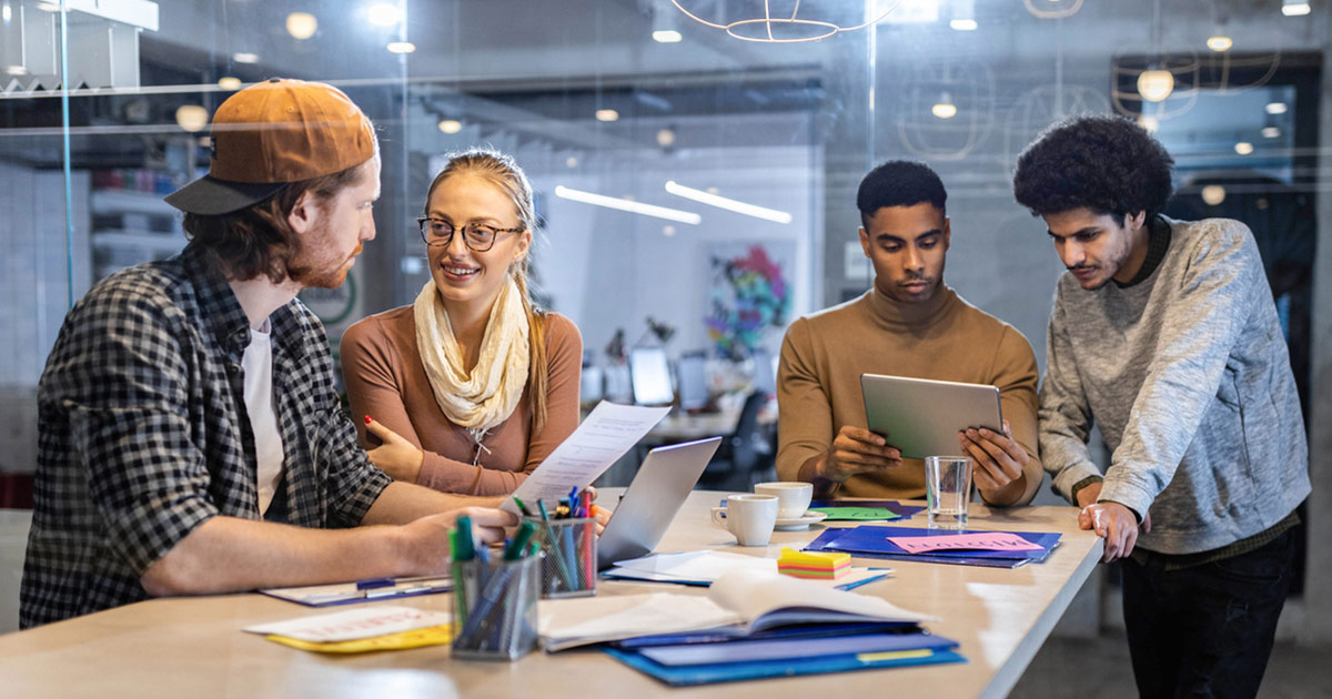 Marketers discussing the benefits of transitioning to HubSpot's CRM for marketing