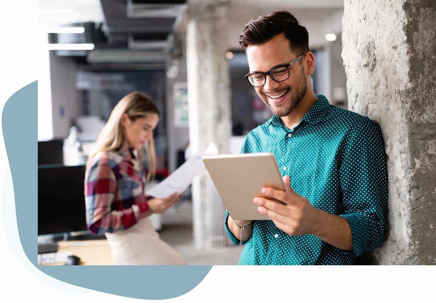 man-holding-tablet-working